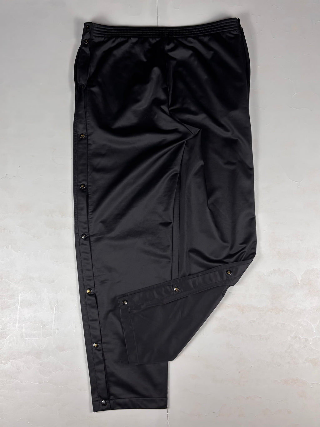 Pantaloni vintage Champion anni ‘90 con bottoni laterali