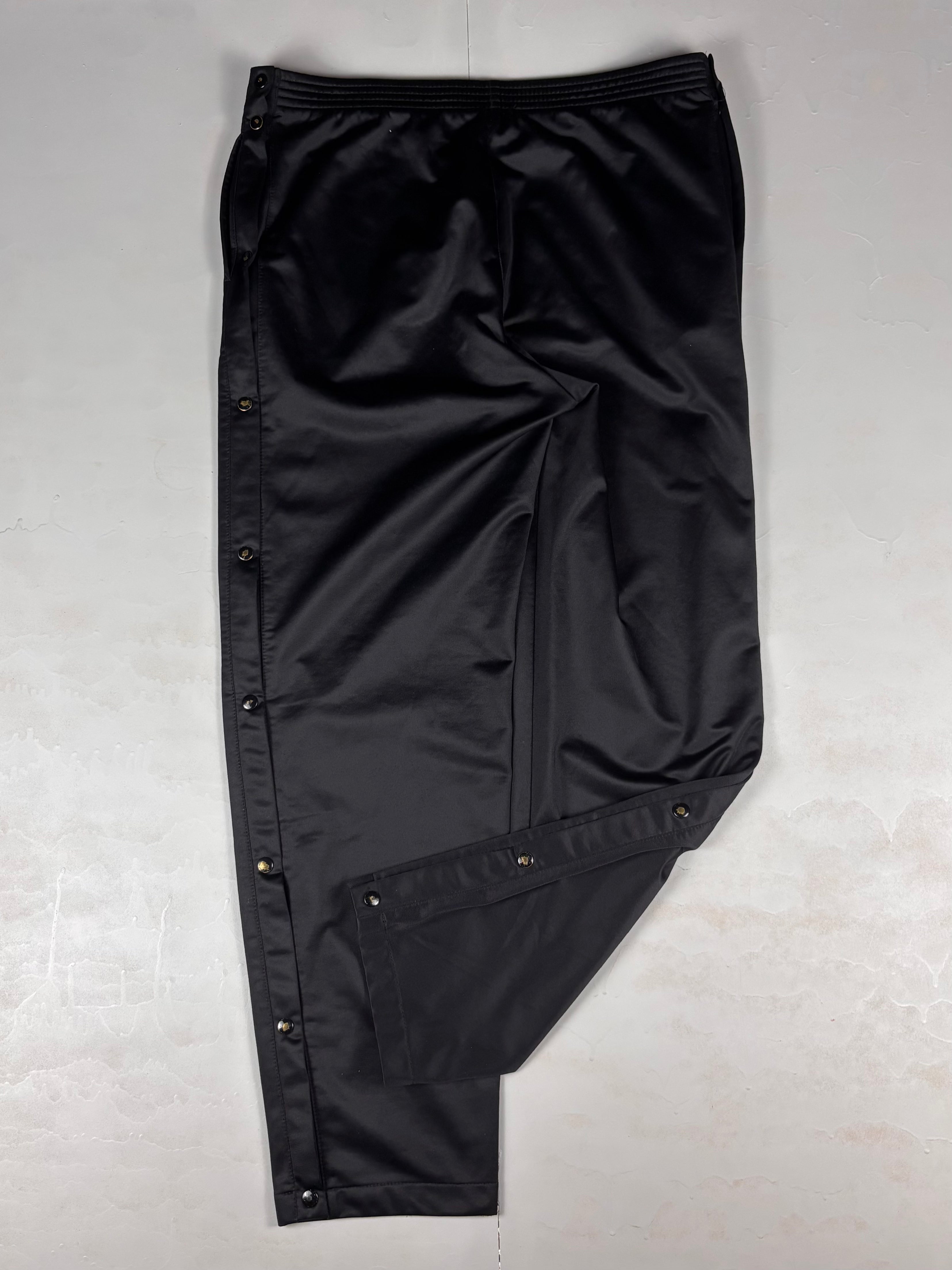 Pantaloni vintage Champion anni ‘90 con bottoni laterali