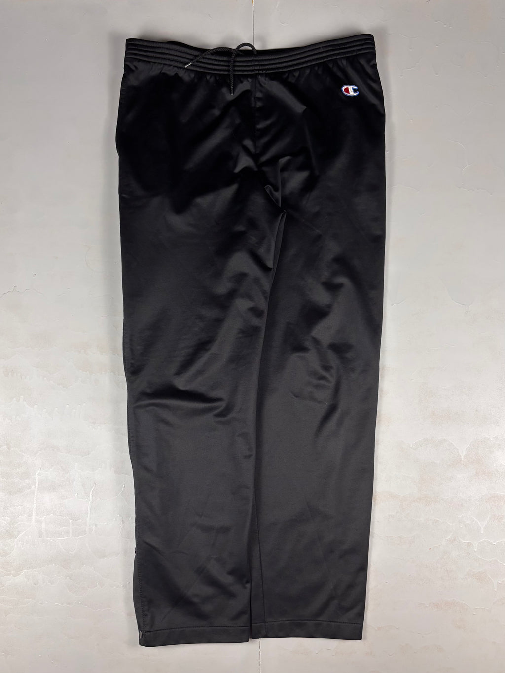 Pantaloni vintage Champion anni ‘90 con bottoni laterali