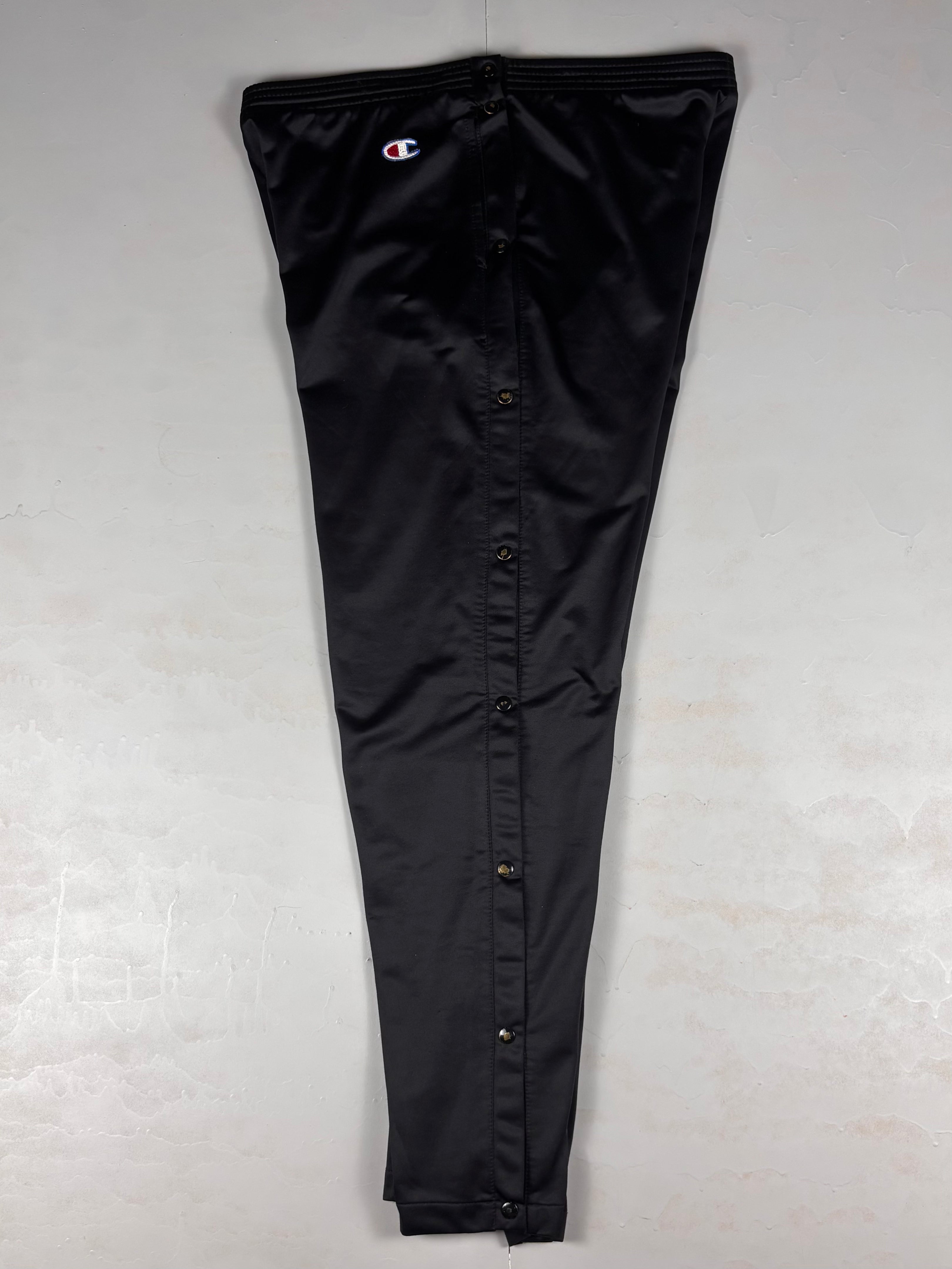 Pantaloni vintage Champion anni ‘90 con bottoni laterali
